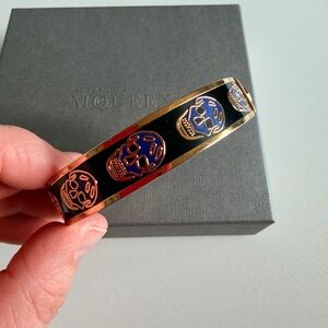 Alexander McQueen Black Enamel and Gold Skull Bangle with Blue Accents